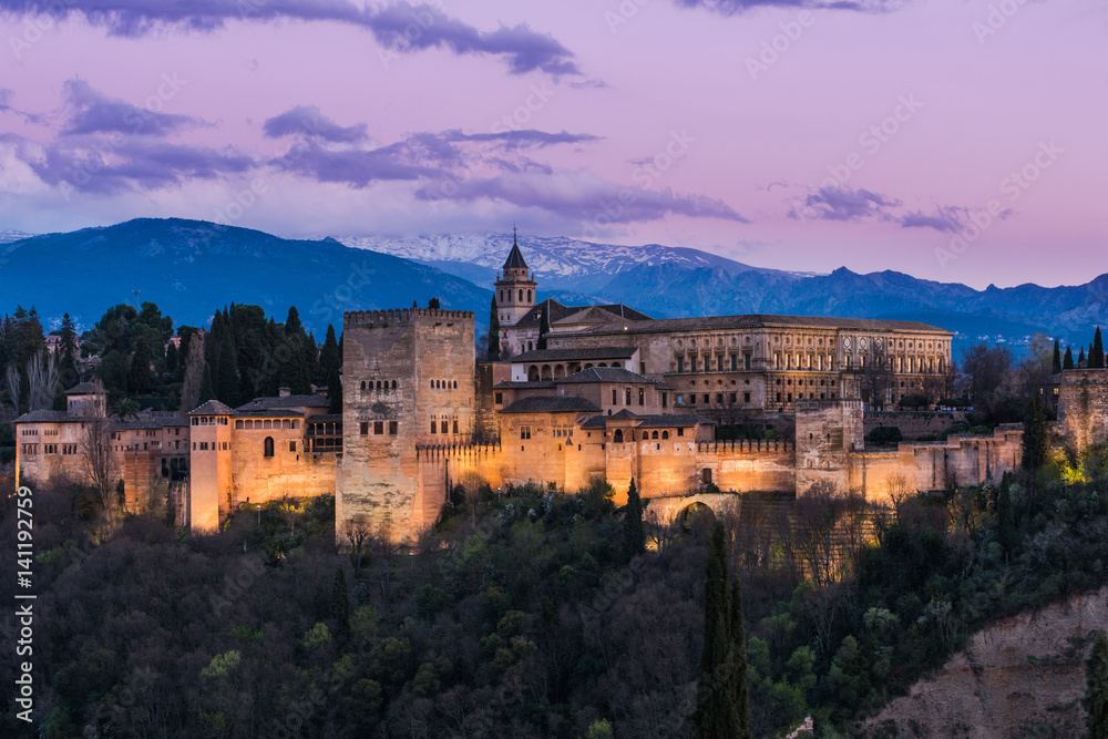 Illuminated Arabic Alhambra palace in Granada,Spain