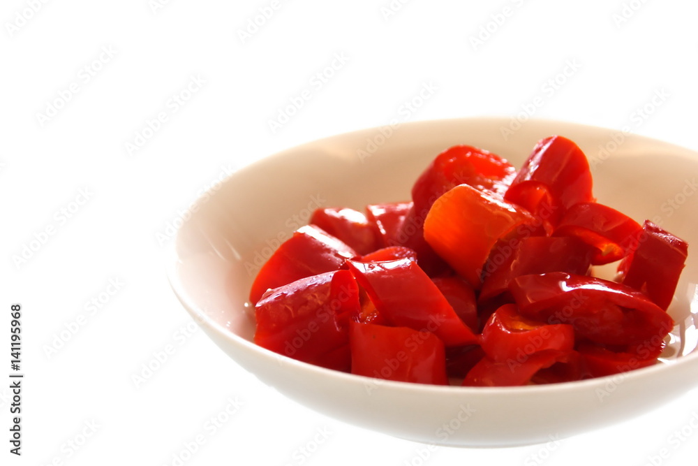 Red pickled-chilli mix with vinegar.
