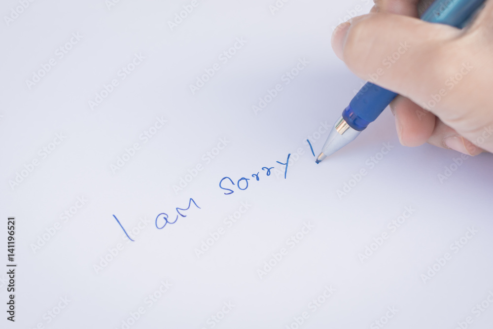 say sorry with a text message on paper and pen say sorry with a text message on paper and pen
