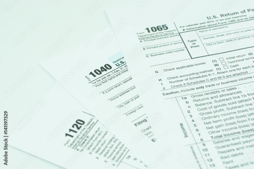 1040,1120,1065 US tax form / taxation concept. USA 1040,1120,1065 US tax form / taxation concept. USA
