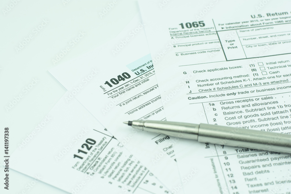 1040,1120,1065 US tax form / taxation concept. USA 1040,1120,1065 US tax form / taxation concept. USA