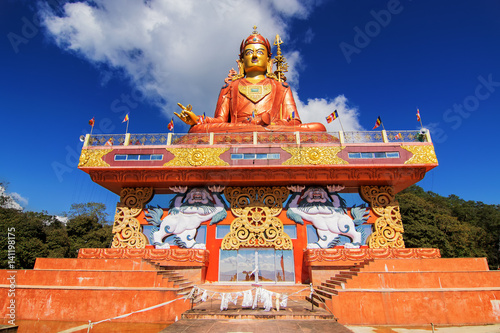 Beautiful Samdruptse statue, a huge buddhist memorial statue in Sikkim, blue cloudy sky in background. Sikkim is a state of India, sitauted in the great mountains of Himalayas.