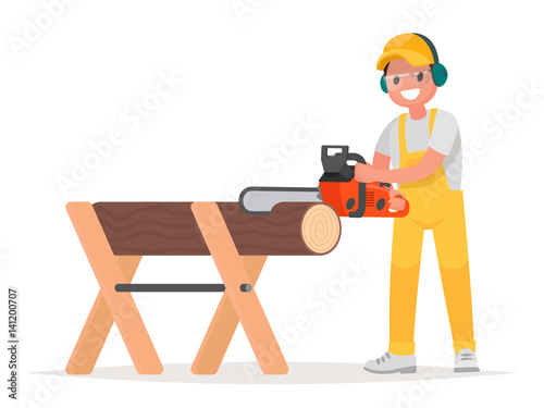 Man dressed in working clothes is sawing a tree with a chainsaw. Work of the woodcutter
