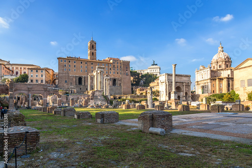 Rome, Italy. Ruins of the Roman forum: the temple of Saturn, the temple of Vespasian, Tabularia, the basilica Julia, the arch of Septimius Severus, the column of Phocas