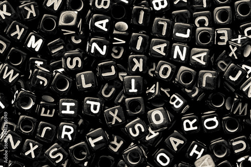English alphabet black cube as background  black and white color tone