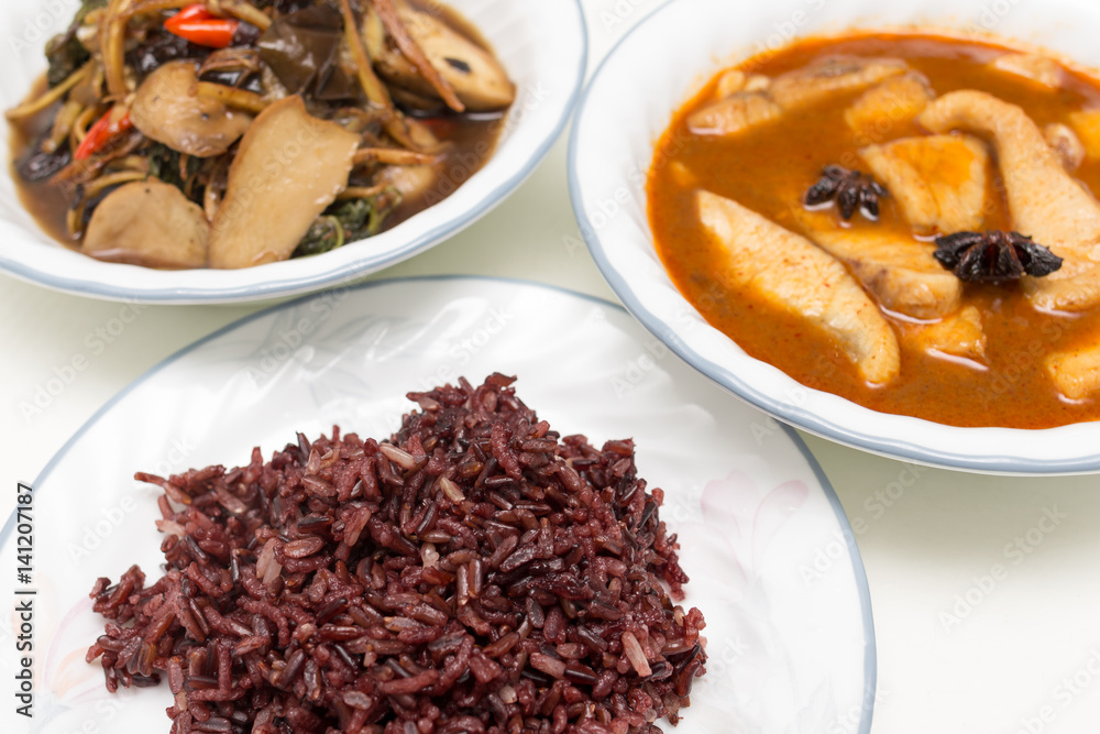 Thai food, Homemade meal of Spicy Stir Fry Japanese Eggplant and Fish Massaman Curry Thai food, Homemade meal of Spicy Stir Fry Japanese Eggplant and Fish Massaman Curry
