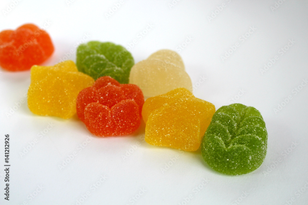 marmalade of different shapes and colors on a white background marmalade of different shapes and colors on a white background