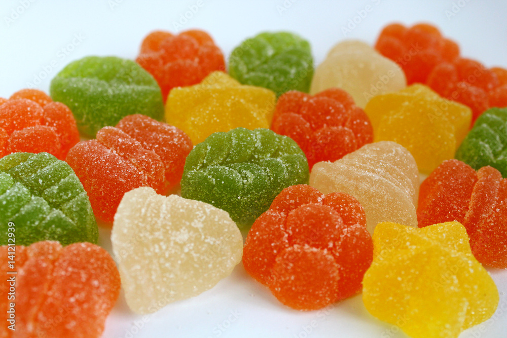 marmalade of different shapes and colors on a white background marmalade of different shapes and colors on a white background