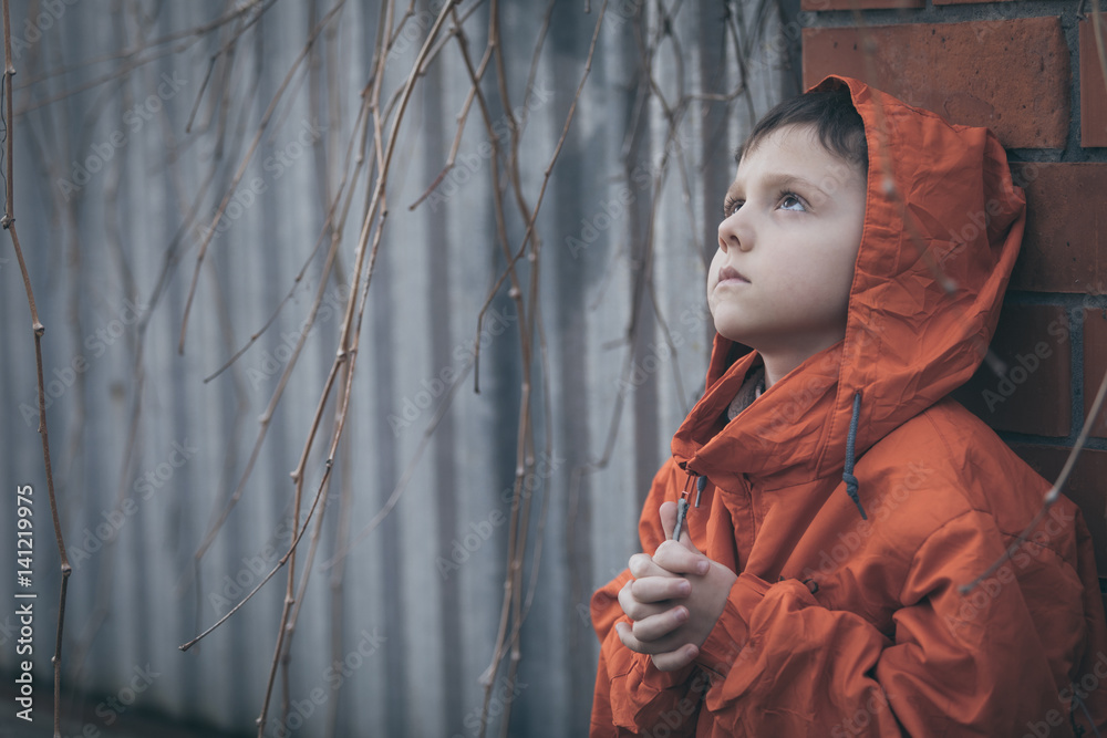 Portrait of sad little boy Stock Photo | Adobe Stock