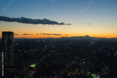 Snow Capped Mt. Fuji Seen from TOCHO (Tokyo Metropolitan Government Building) During Sunset