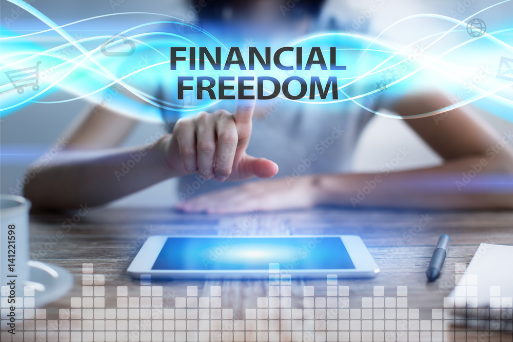 Woman using tablet pc, pressing on virtual screen and selecting financial freedom. Woman using tablet pc, pressing on virtual screen and selecting financial freedom.