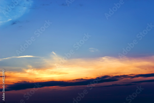 Sunset with sun rays, sky with clouds and sun. © sergofan2015