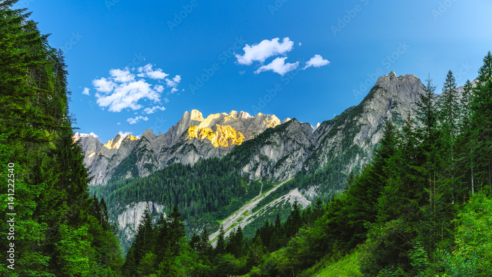 Austrian Alps at Sunset with Blue Sky and White CLouds