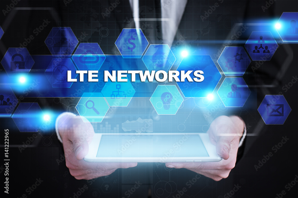 Businessman holding tablet PC with lte networks concept. Businessman holding tablet PC with lte networks concept.