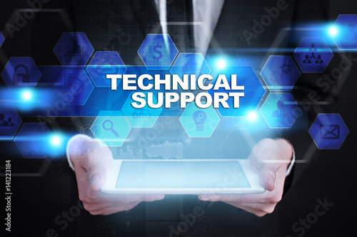 Businessman holding tablet PC with technical support concept.