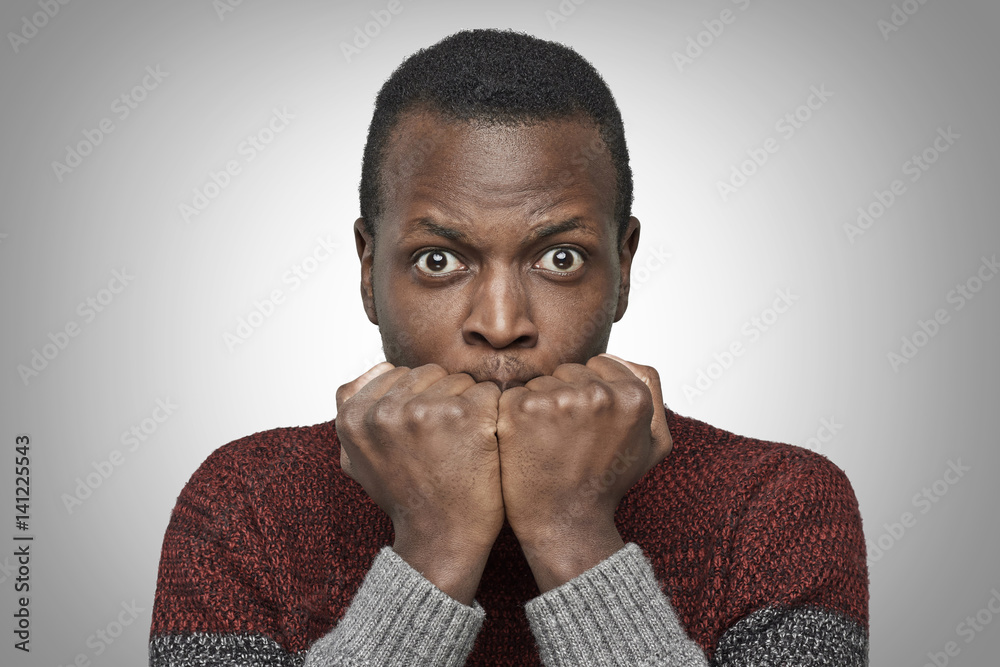 Scared black man face. Stock Photo