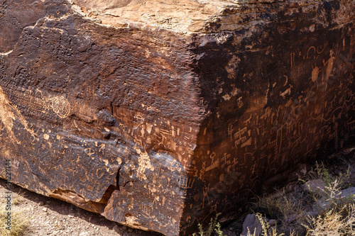 Petroglyphs of Newspaper Rock, a group of rockfaces with over 650 ancient carvings in Petrified Forest National Park, Arizona. The designs were created between 650 and 2,000 years ago.