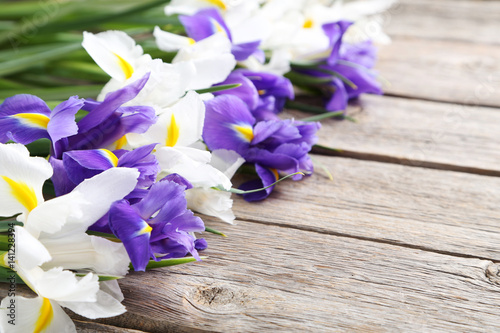 Fototapeta Naklejka Na Ścianę i Meble -  Bouquet of iris flowers on grey wooden table