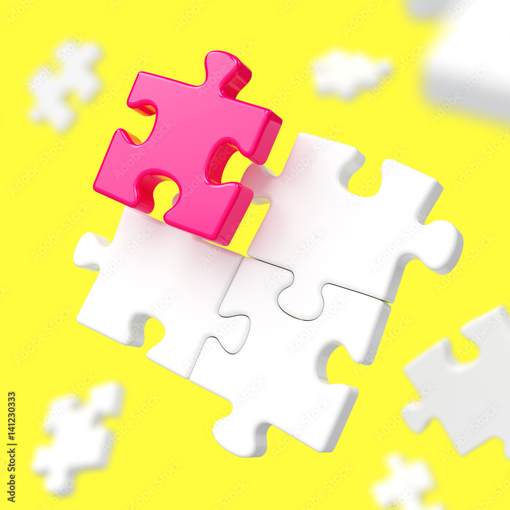 Assembling puzzle pieces on yellow background