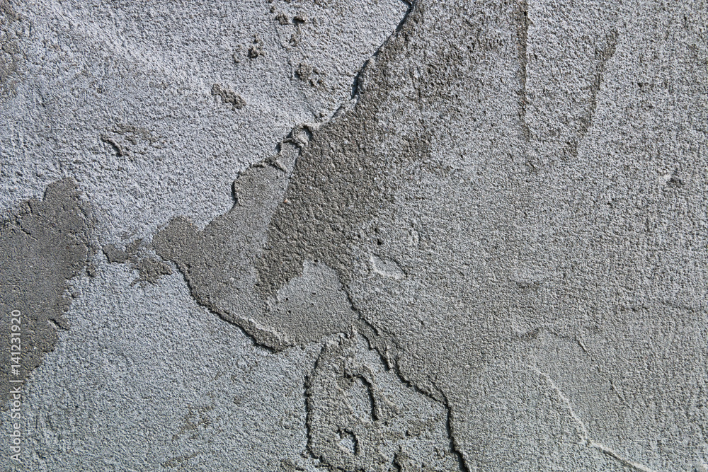 Stone plaster wall background and texture style. Smears on a concrete wall. Stone plaster wall background and texture style. Smears on a concrete wall.