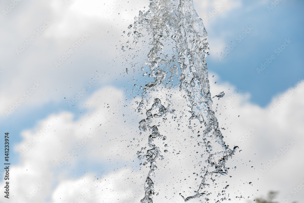 splashes of water from a fountain splashes of water from a fountain