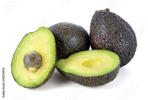 Fresh avocado fruits isolated on white