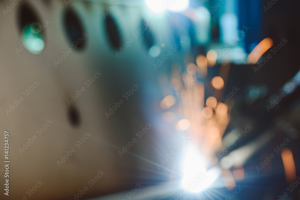 Defocused view of steel welding Defocused view of steel welding