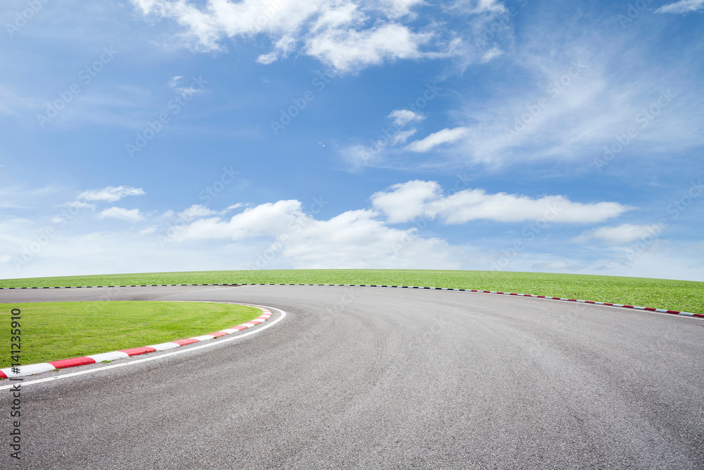 Fototapeta premium empty asphalt road with green grass on sky background.