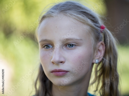 Beautiful young girl outdoors  portrait children close up