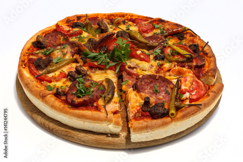 Pizza with sausage, mushrooms and hot pepper.