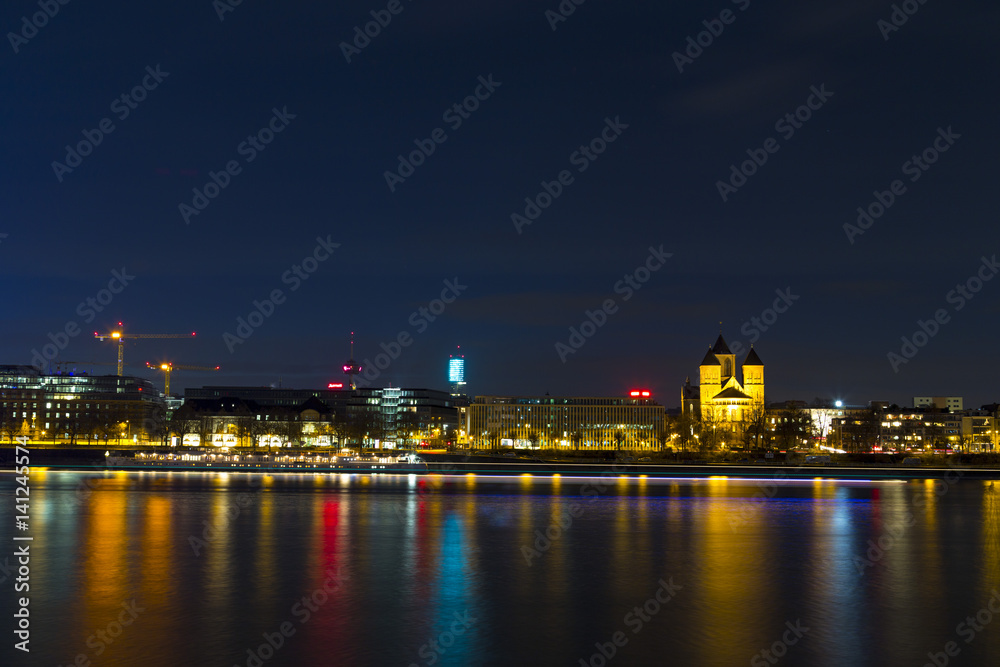 Panorama and cityscape of Cologne over the Rein river at night