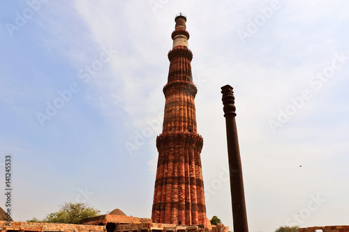Qutub Minar & Iron Pillar in Qutub complex, one of Delhi's most curious structures, made of 98% wrought iron and has stood 1,600 years without rusting or decomposing.