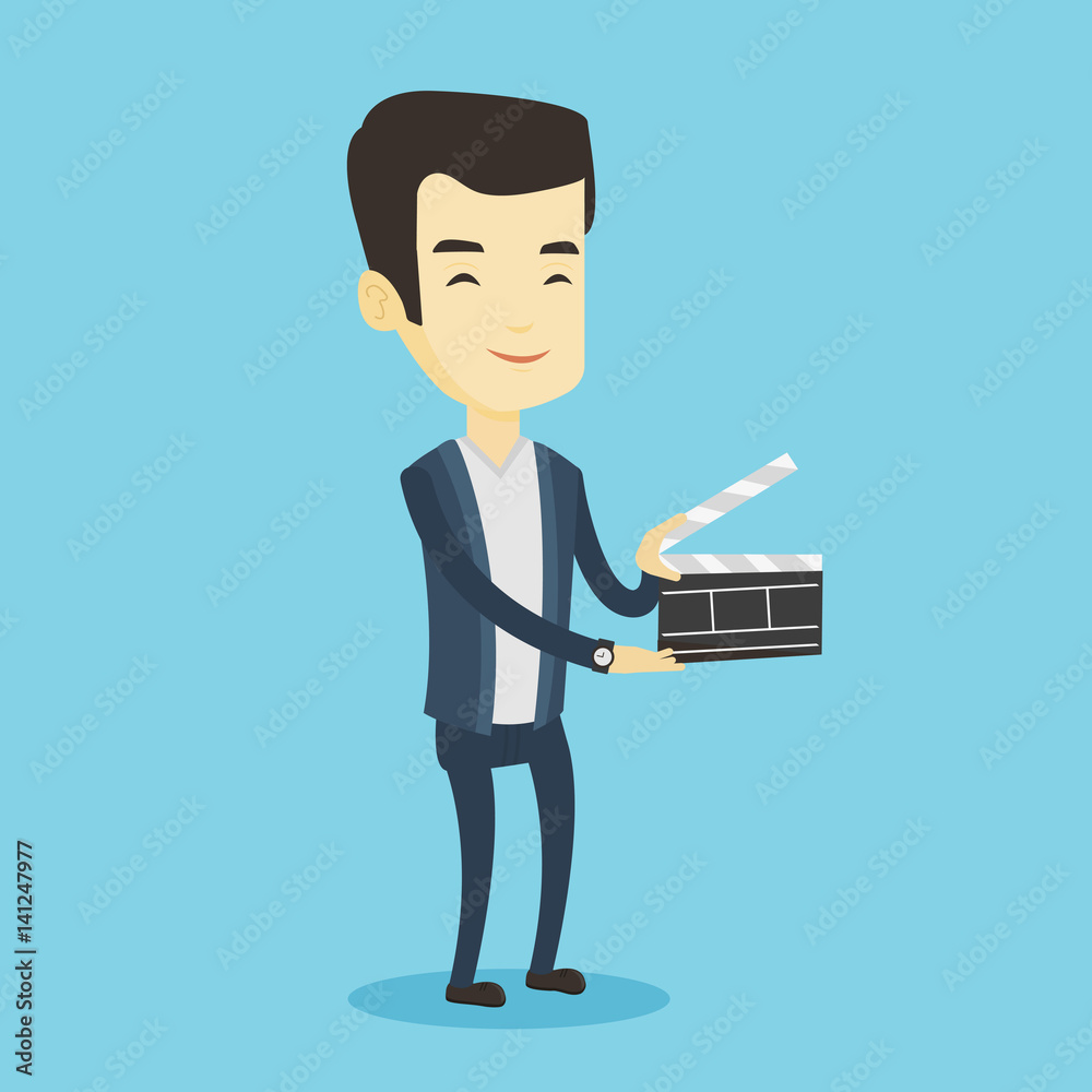 Smiling man holding an open clapperboard. Smiling man holding an open clapperboard.