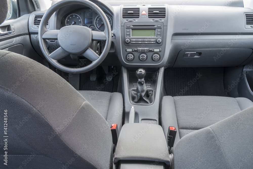 Car interior details with dashboard, speedometer, seat etc.