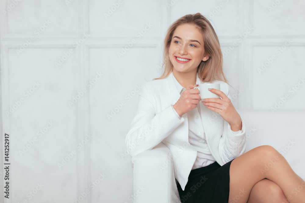 Portrait of beautiful young woman working in the office. Portrait of beautiful young woman working in the office.