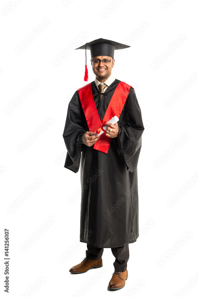 Male african american graduate in gown and cap Male african american graduate in gown and cap