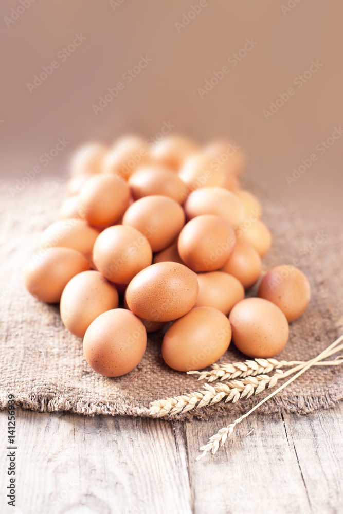 Eggs on wooden background closeup.. Eggs on wooden background closeup..
