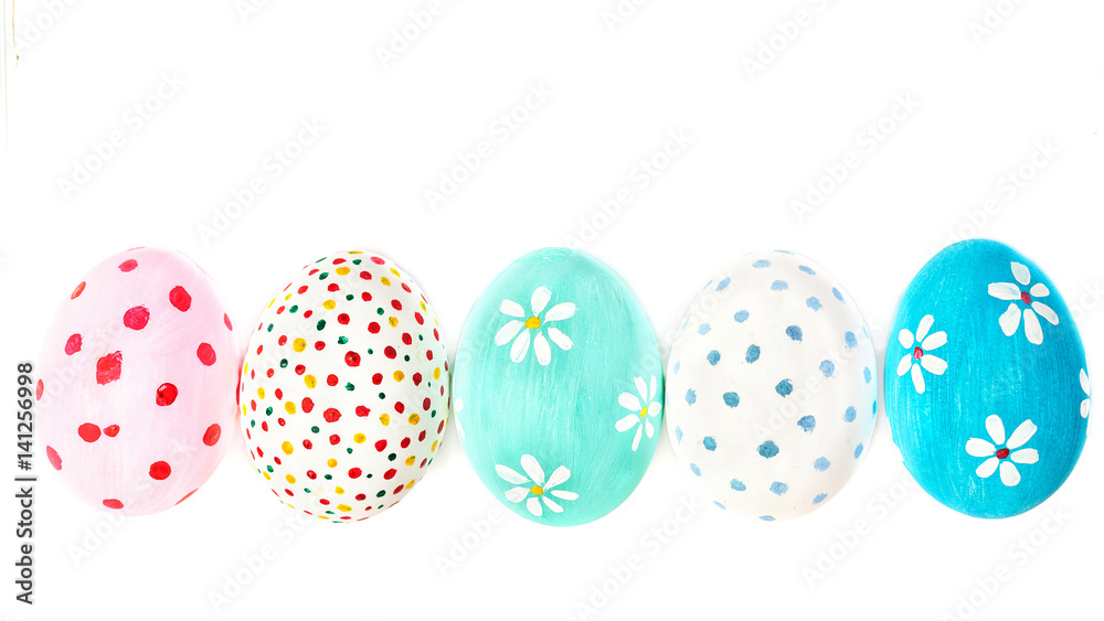 Colorful handmade Easter Eggs isolated on a white background  with copyspace. Happy Easter!.