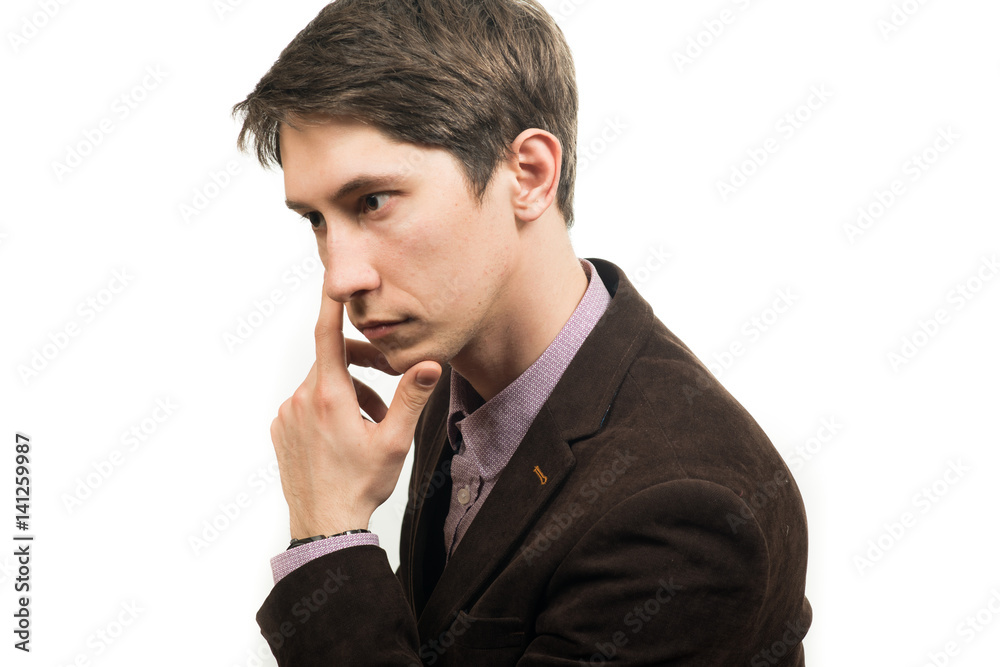 Portrait of a young pensive businessman with a headache Portrait of a young pensive businessman with a headache