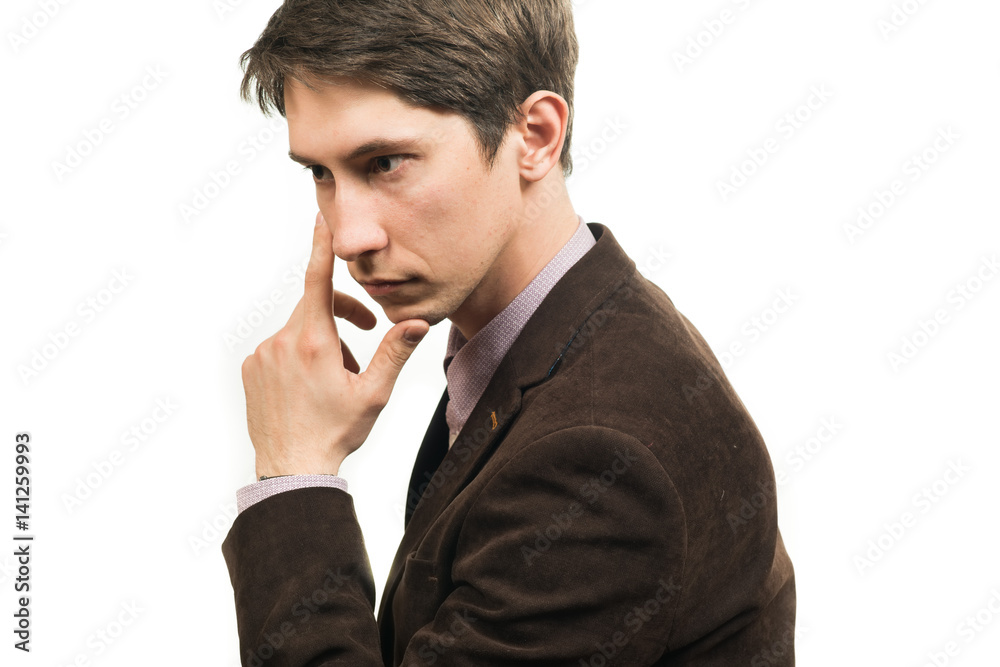Portrait of a young pensive businessman with a headache Portrait of a young pensive businessman with a headache