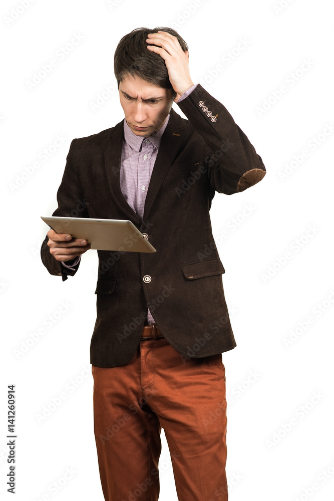 Portrait of handsome man thinking and looking business with a tablet in hand isolated Portrait of handsome man thinking and looking business with a tablet in hand isolated
