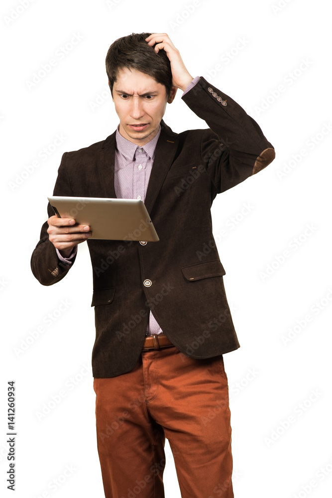 Portrait of handsome man thinking and looking business with a tablet in hand isolated Portrait of handsome man thinking and looking business with a tablet in hand isolated