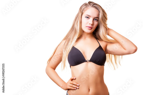 Hot sexy blonde in swimwear on white background