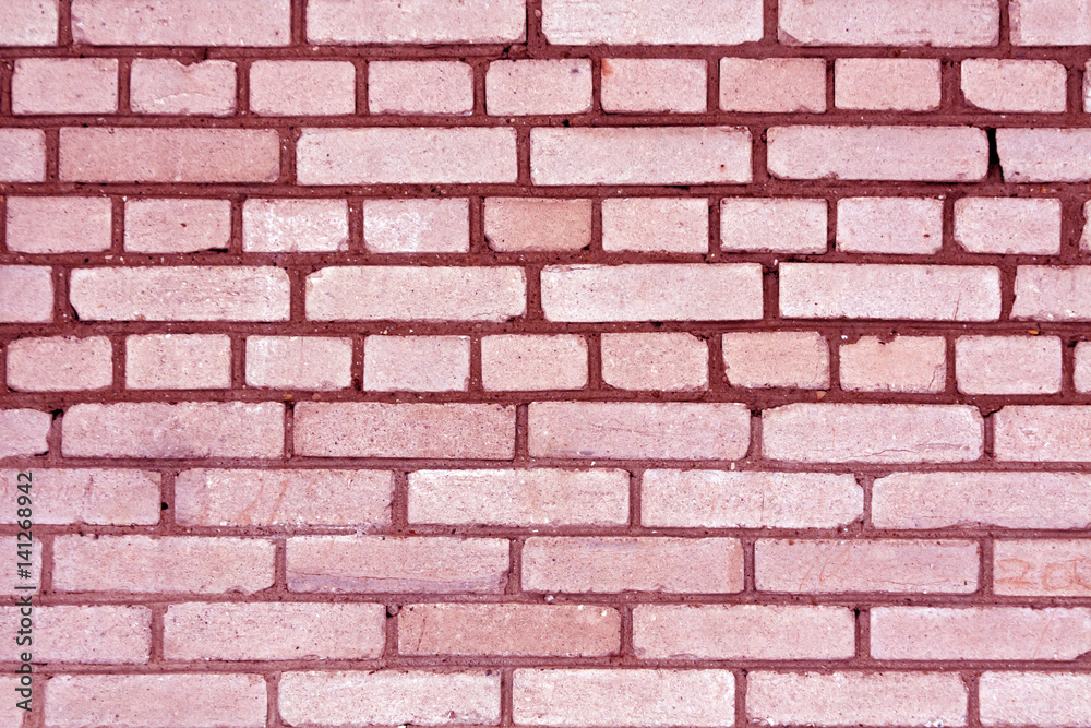 Obraz premium Pink color grungy brick wall pattern.