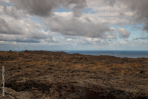 Paesaggio desertico di sabbia vulcanica nel Parco Nazionale di Timanfaya in Lanzarote - Canarie
 photo