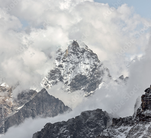 Moonlight view on one of the highest peaks of the world Cho Oyu (8201 m). View from the moraine near the third of the lake - Gokyo region, Nepal, Himalayas photo