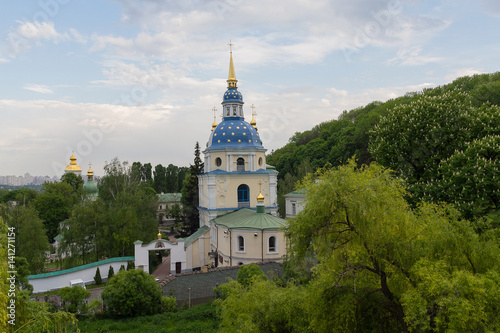 View of the Vydubychi monastery among the trees. Kiev, Ukraine