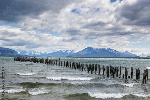 Old wooden pier in Last hope bay. Puerto Natales, Antarctic Patagonia, Chile