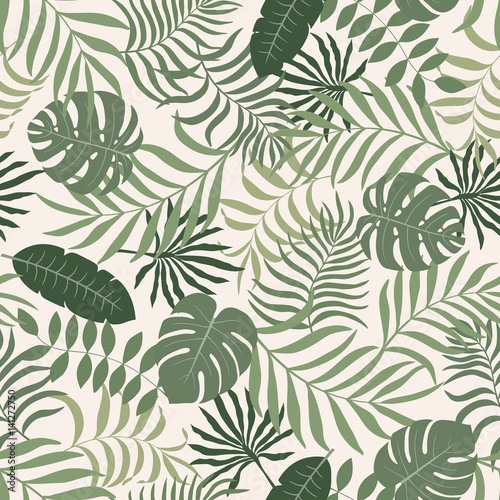 Tropical background with palm leaves. Seamless floral pattern