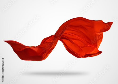 Smooth elegant red cloth on gray background